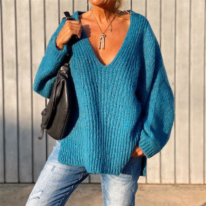 V-neck knitted sweater with side slits