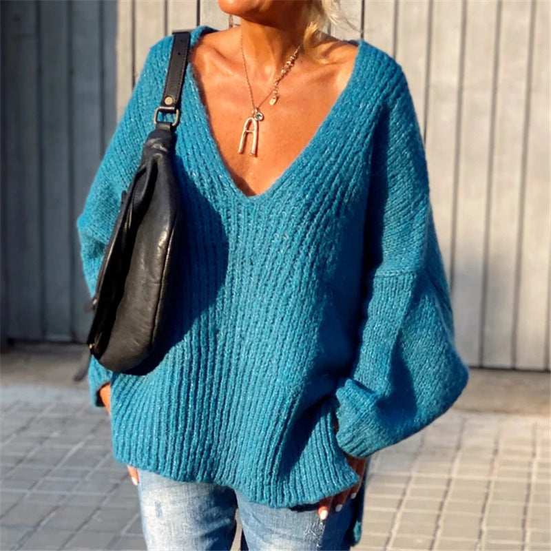 V-neck knitted sweater with side slits