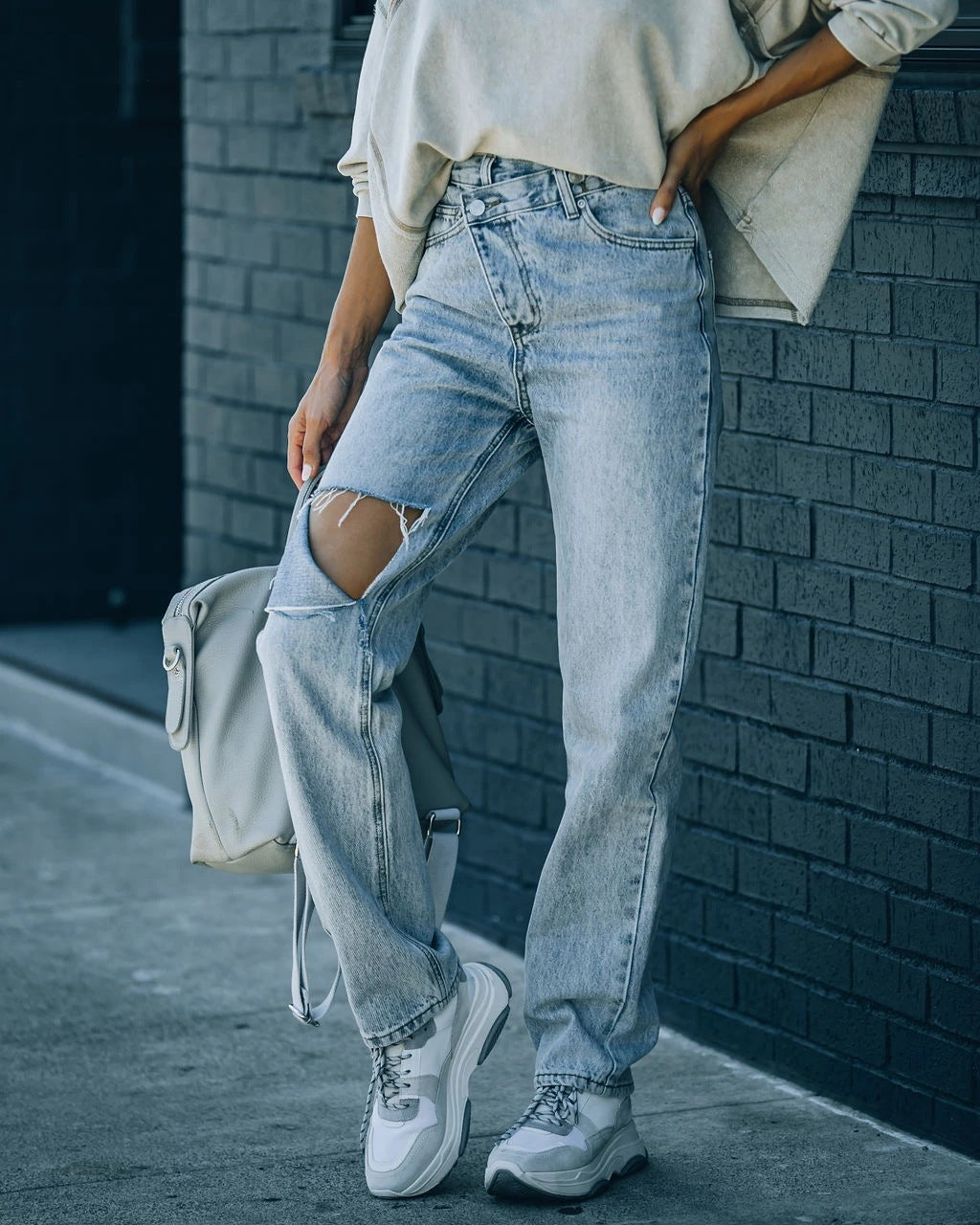 Women's Versatile irregular ripped ripped casual denim trousers