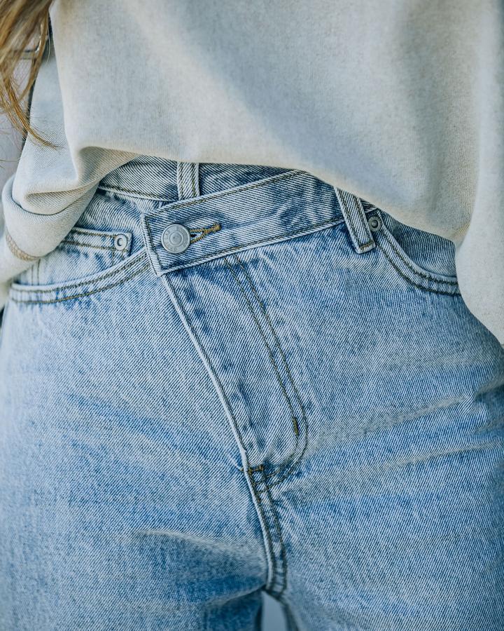 Women's Versatile irregular ripped ripped casual denim trousers
