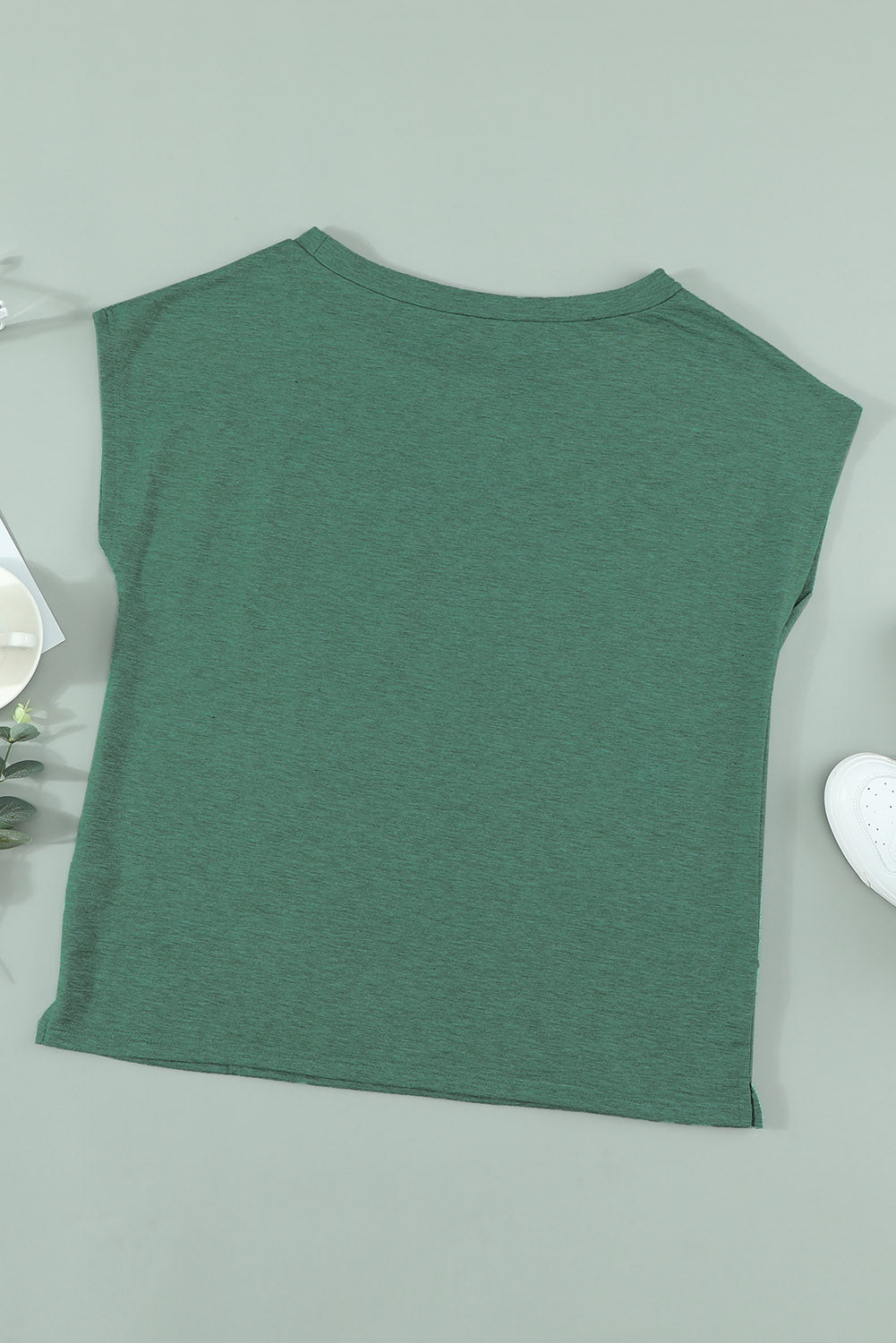Women's Green Pocketed O Neck Short Sleeve Tee with Side Slits