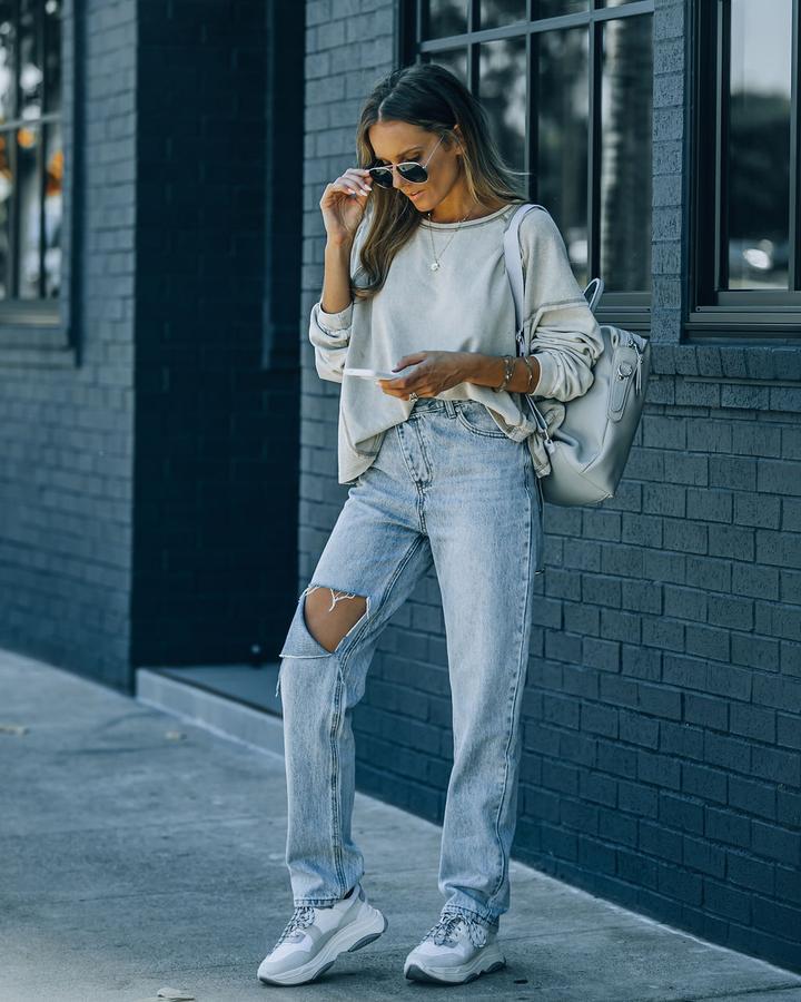 Women's Versatile irregular ripped ripped casual denim trousers