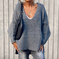 V-neck knitted sweater with side slits