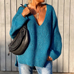 V-neck knitted sweater with side slits