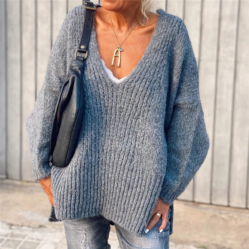 V-neck knitted sweater with side slits