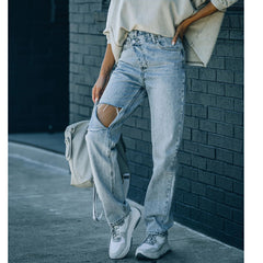 Women's Versatile irregular ripped ripped casual denim trousers
