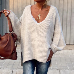 V-neck knitted sweater with side slits
