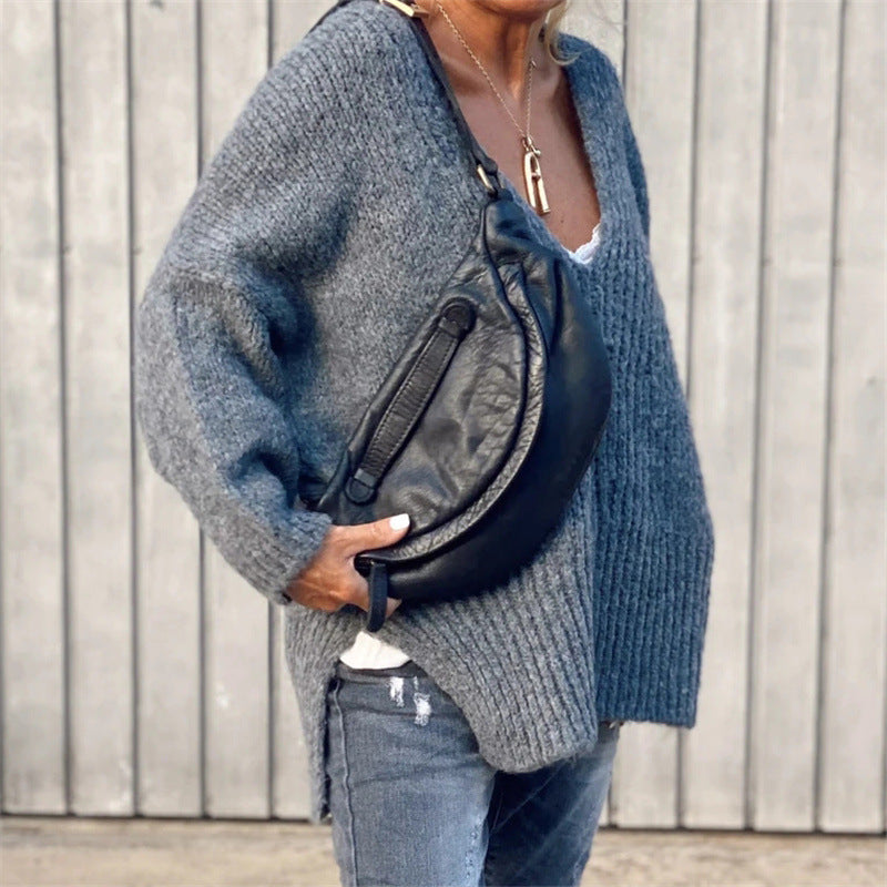 V-neck knitted sweater with side slits