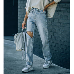 Women's Versatile irregular ripped ripped casual denim trousers